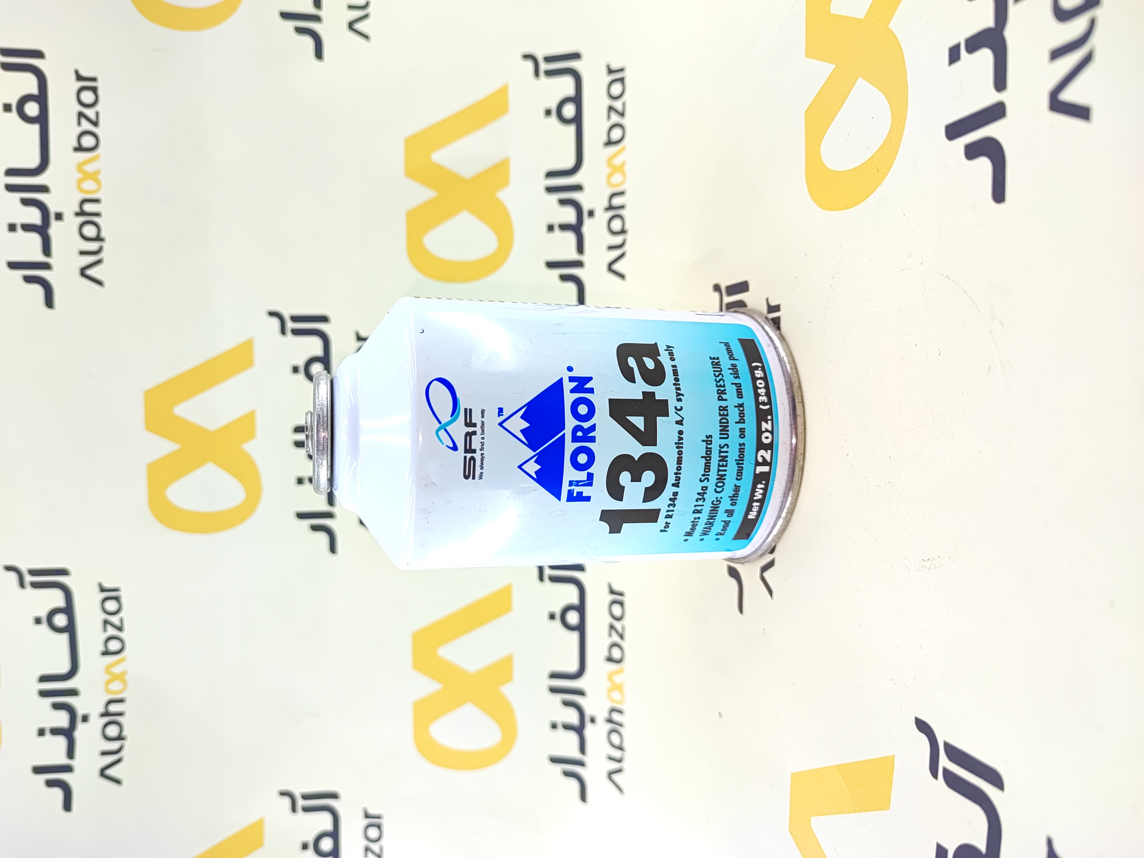 کپسول گاز مبرد R-134a برند فلورون FLORON وزن 340 گرم 12 اونس مخصوص سیستم کولر خودرو با بسته‌بندی آبی و سفید